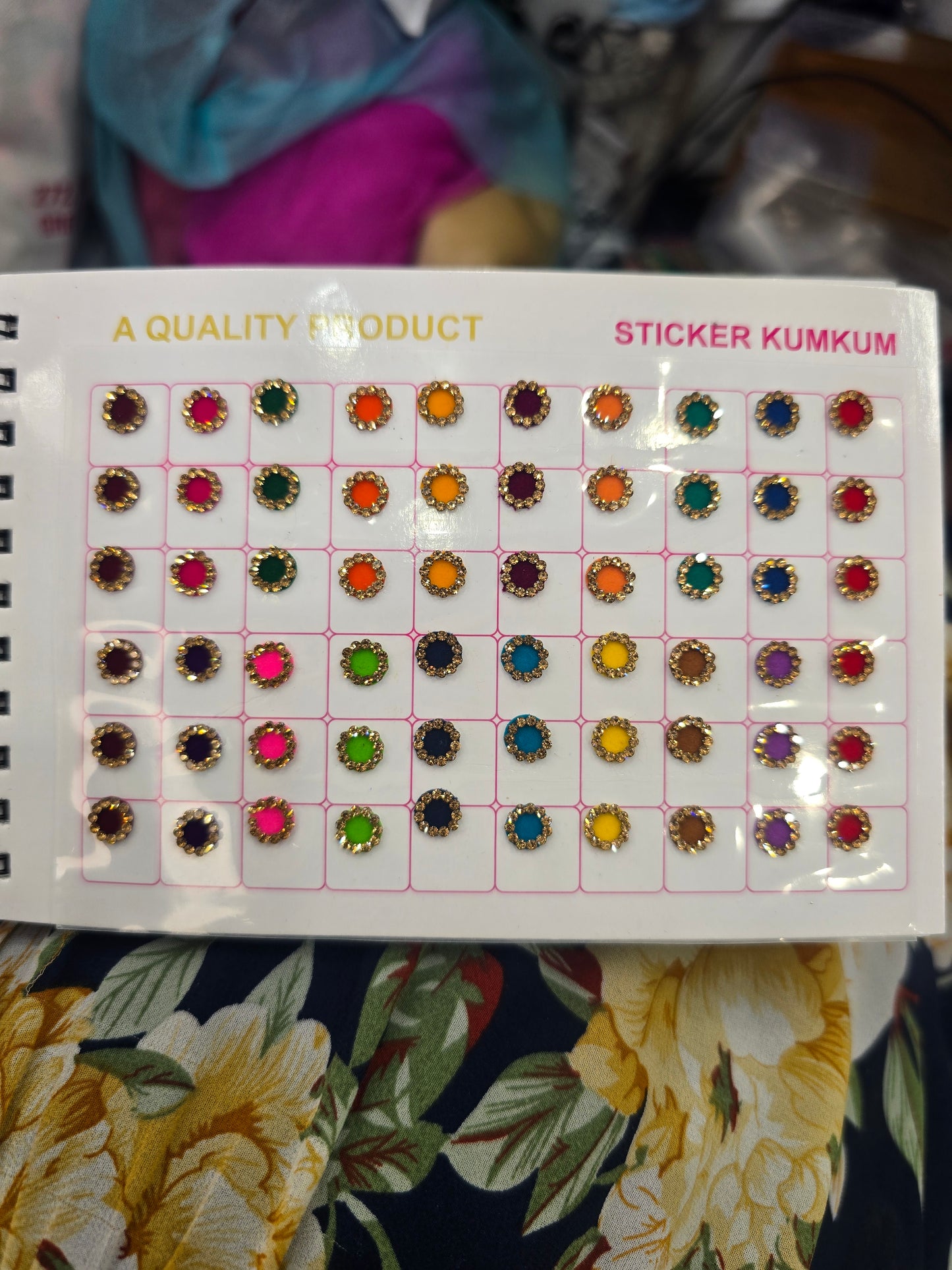 Beautiful designer gold stone tikka/bindi book