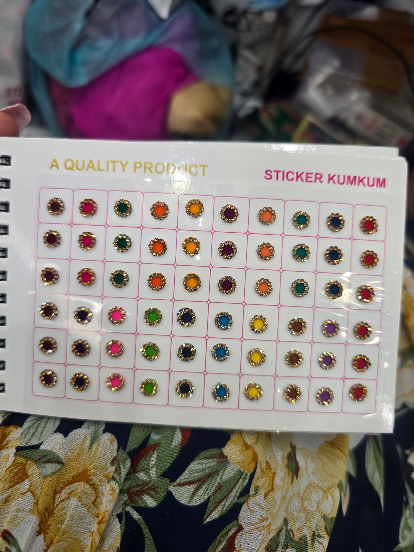 Beautiful designer gold stone tikka/bindi book