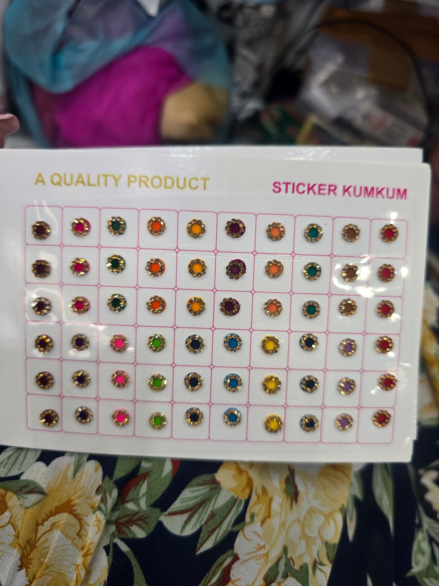 Beautiful designer gold stone tikka/bindi book