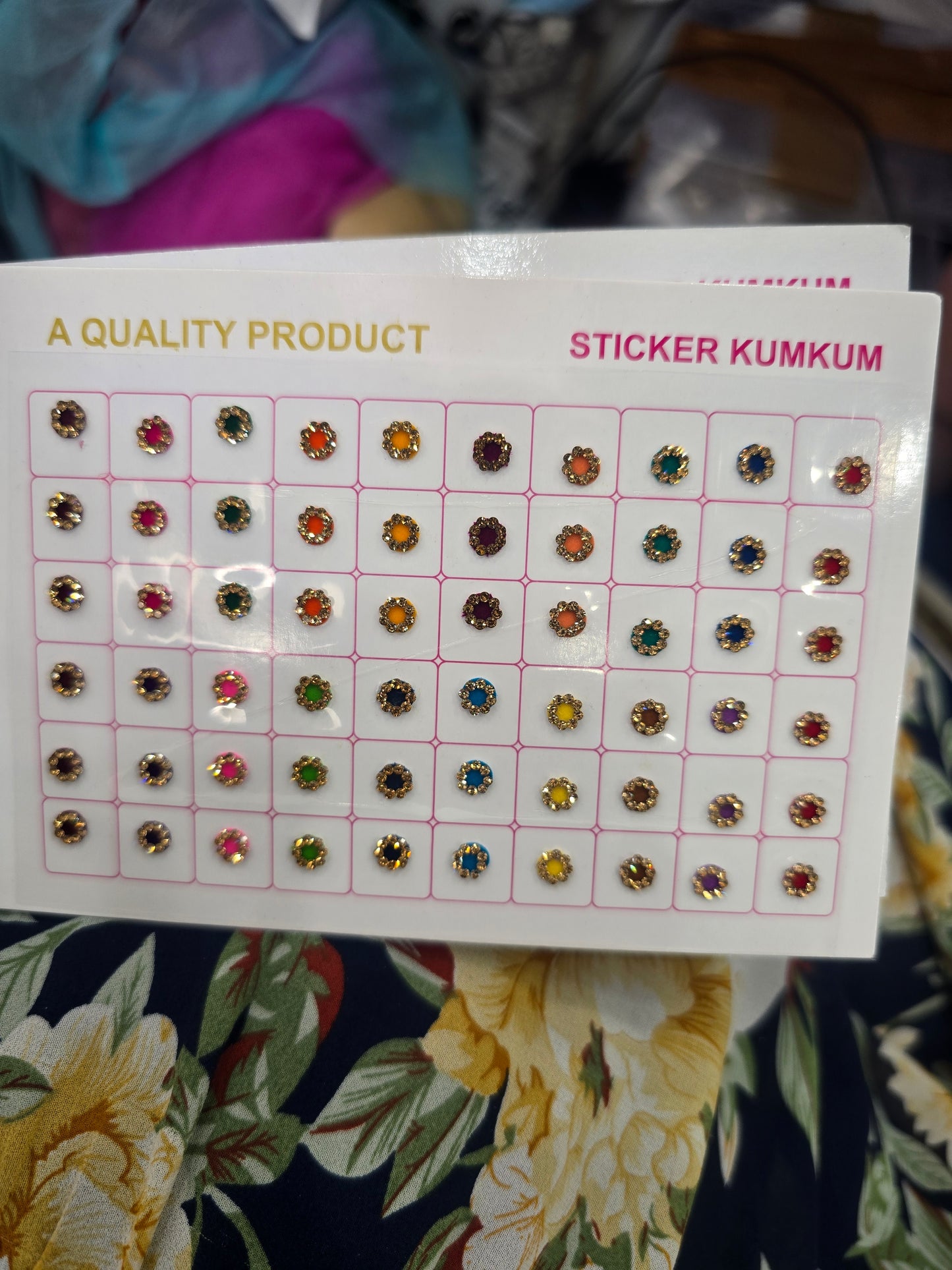 Beautiful designer gold stone tikka/bindi book