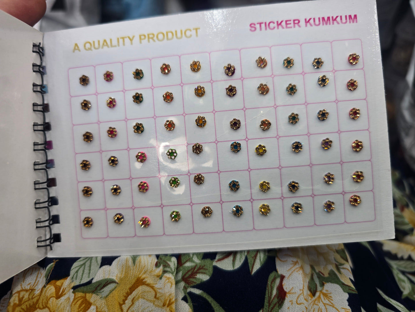 Beautiful designer gold stone tikka/bindi book