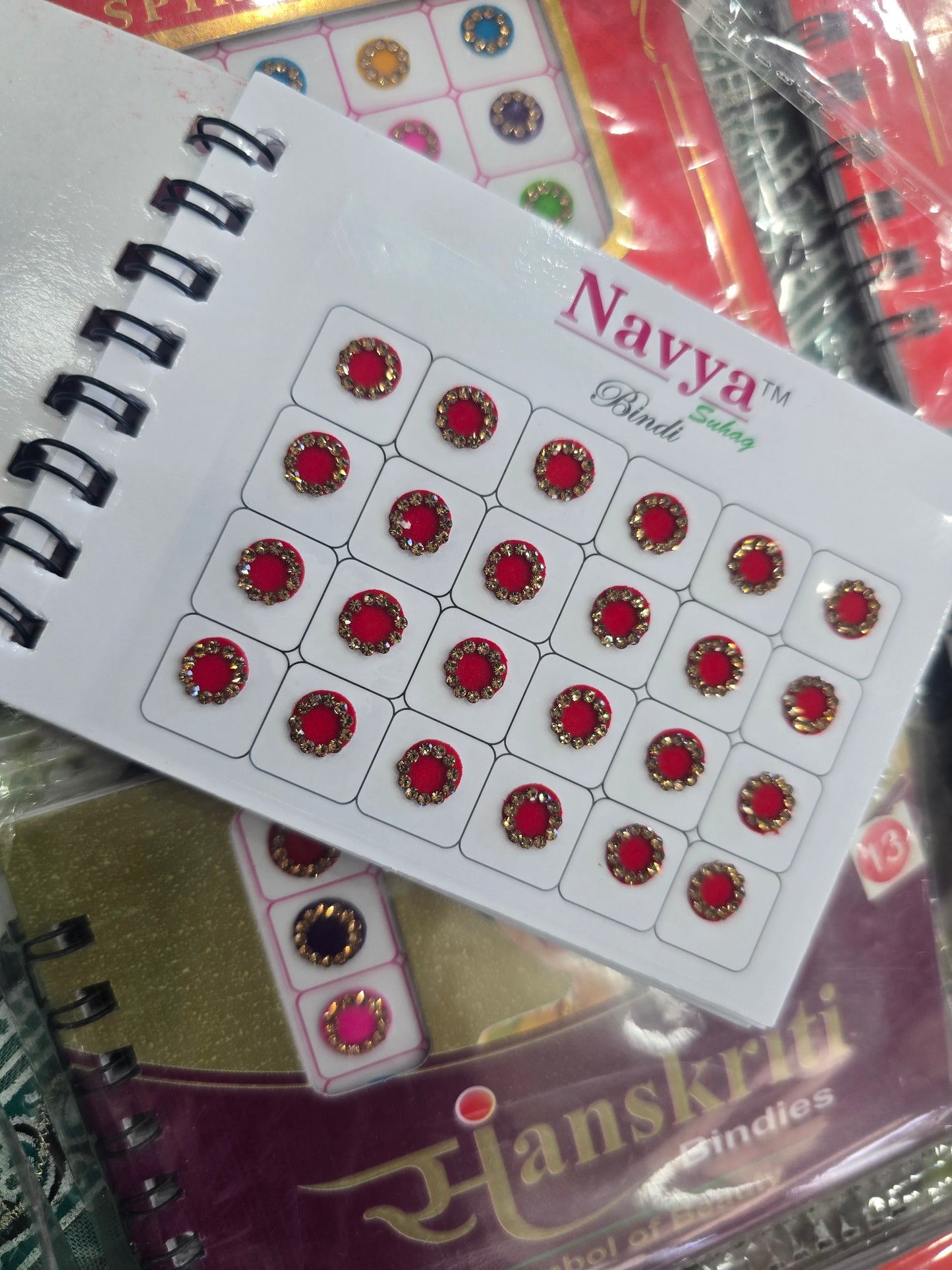 Beautiful designer gold stone tikka/bindi book