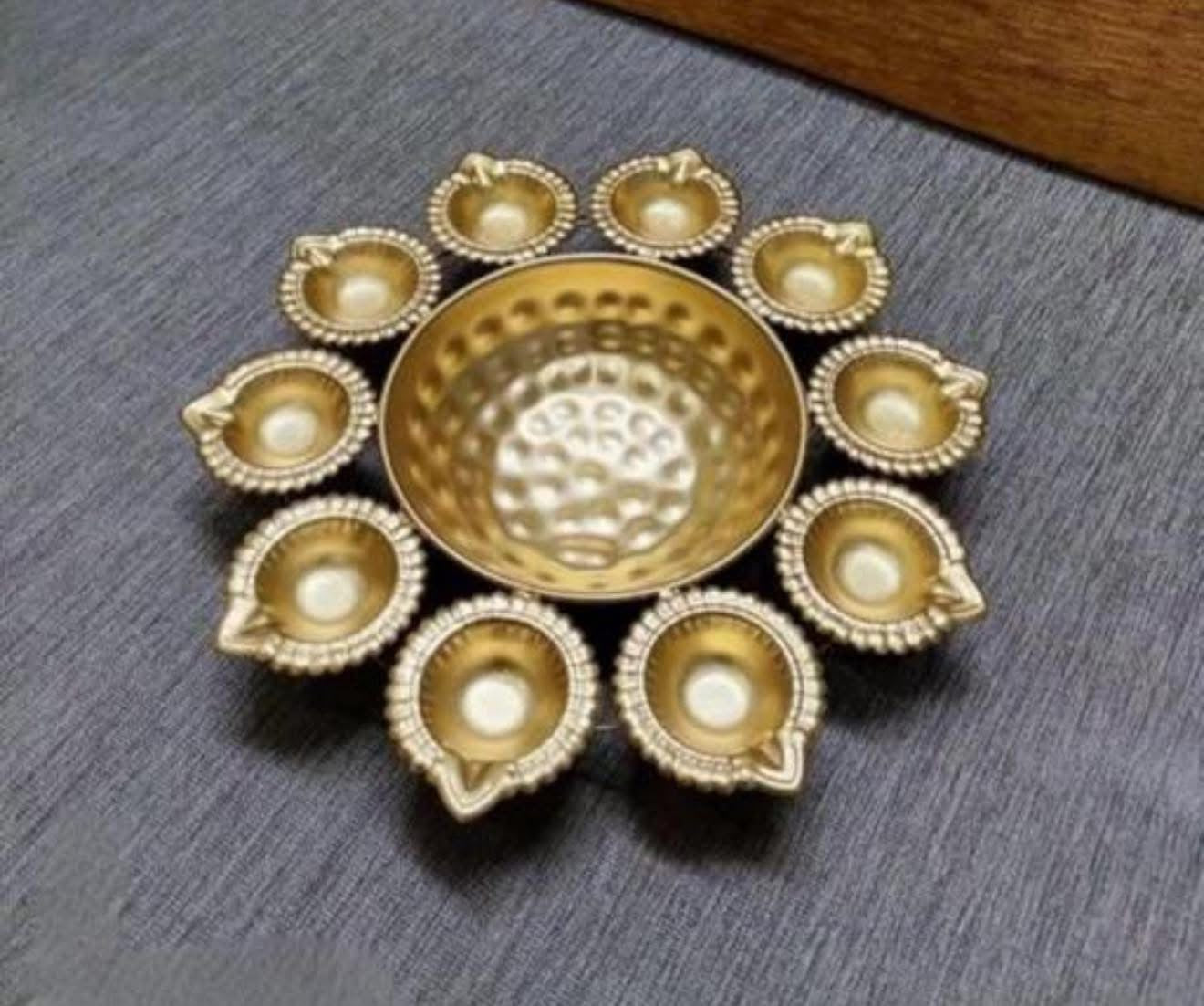 Beautiful designer metal Diya urli bowl for decoration