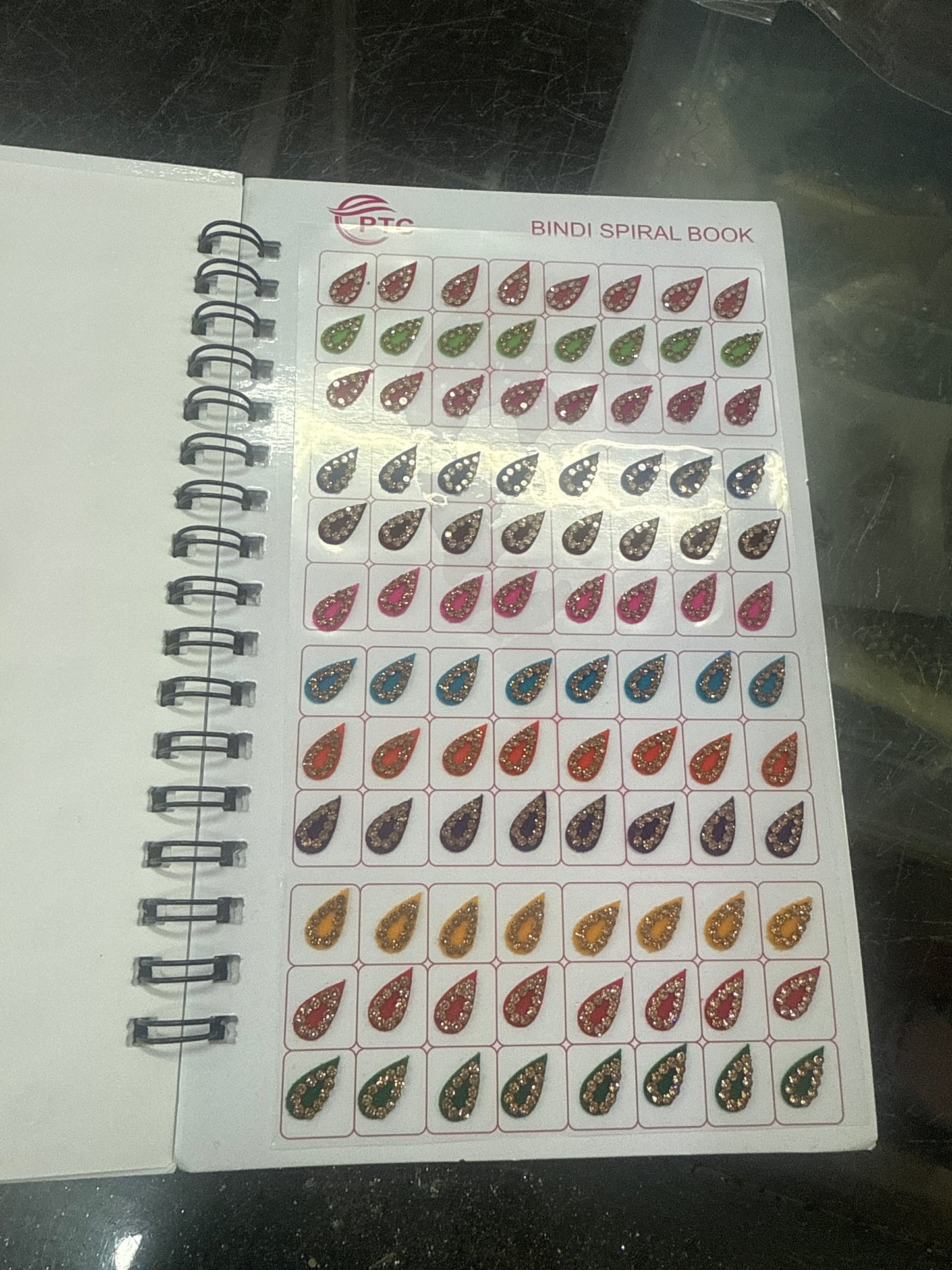 Beautiful designer stone bindi book