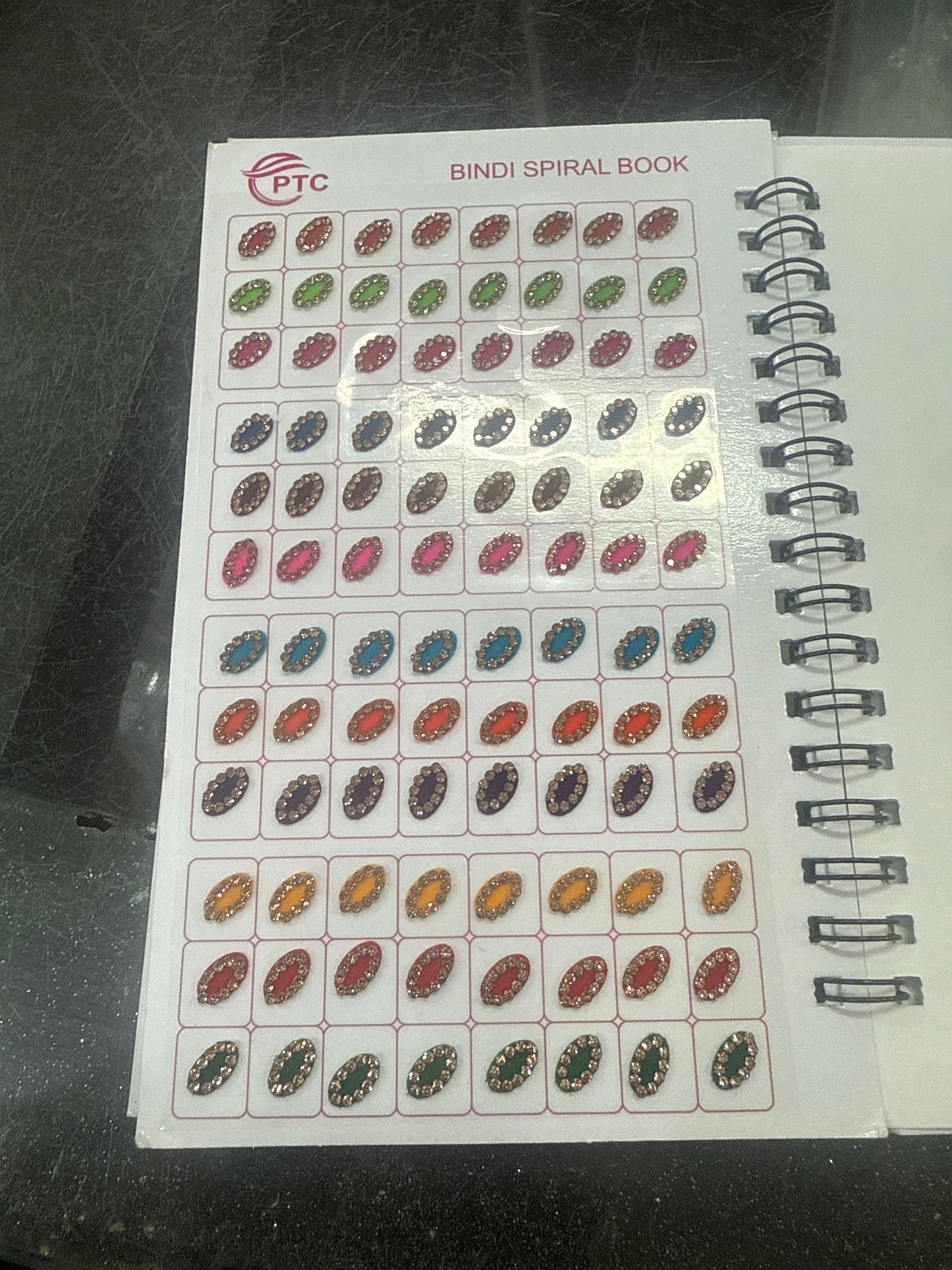 Beautiful designer stone bindi book