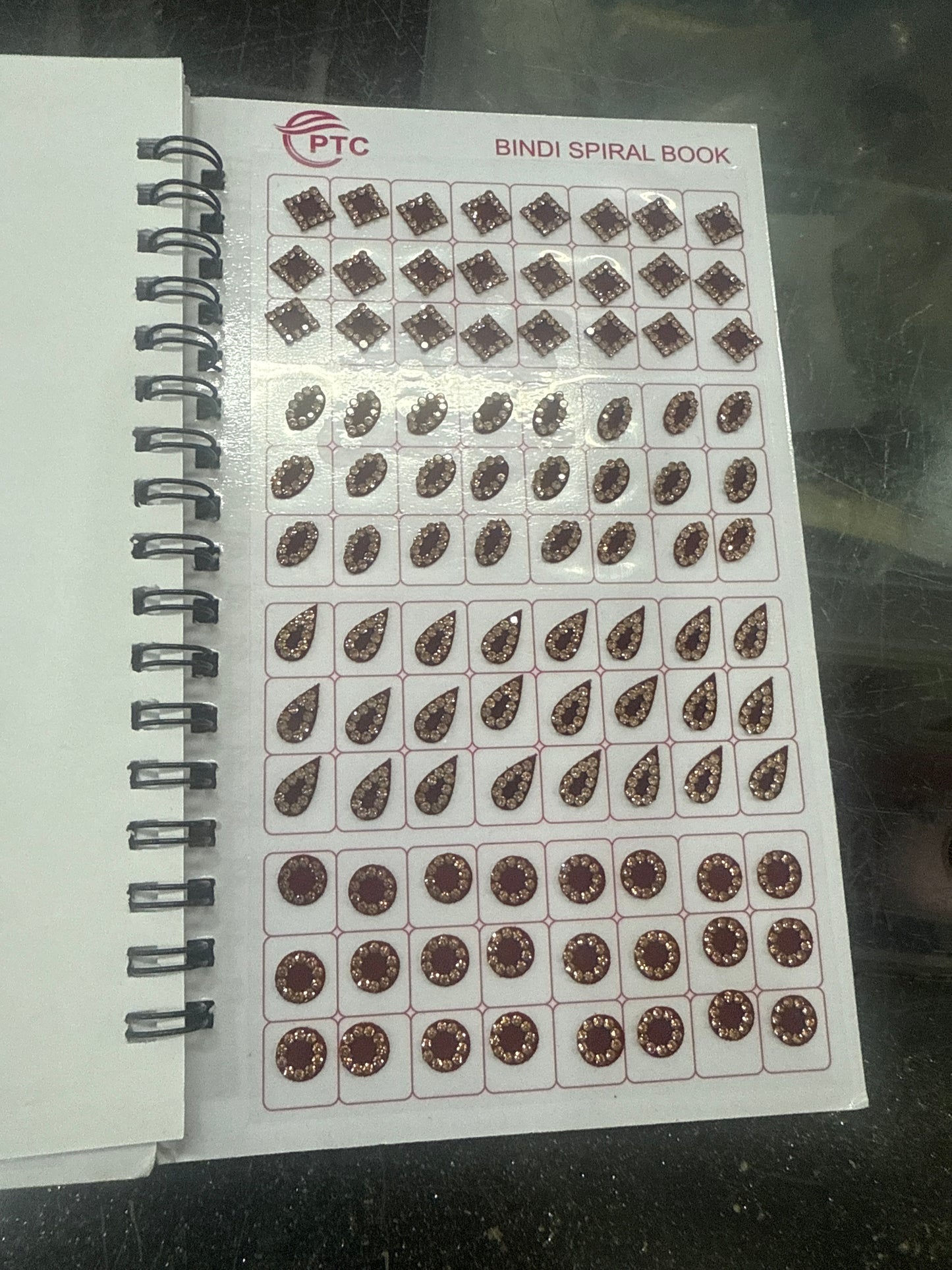 Beautiful designer stone bindi book