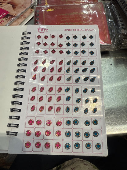 Beautiful designer gold stone tikka/bindi book