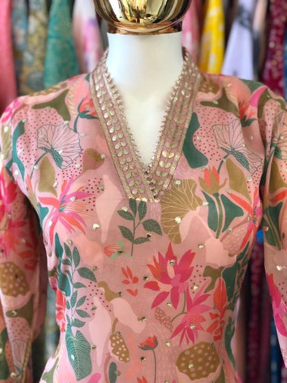 Beautiful designer floral sharara suit