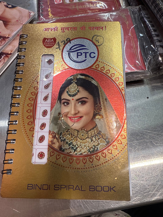 Beautiful designer gold stone tikka/bindi book