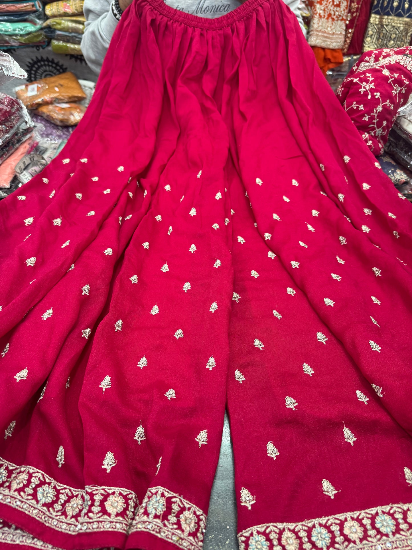 Beautiful designer peplum top plazo suit