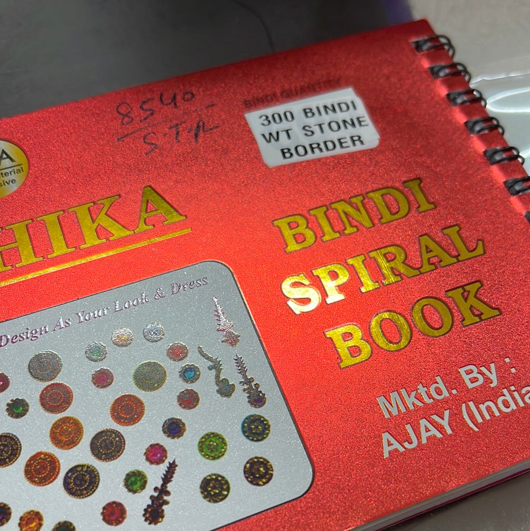 Beautiful designer white stone tikka/bindi book