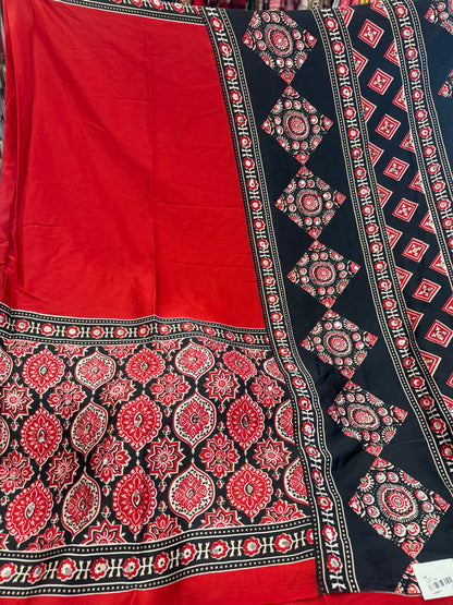 Beautiful designer Ajrakh Modal Silk Saree with Mirror Work & Pallu Tassels
