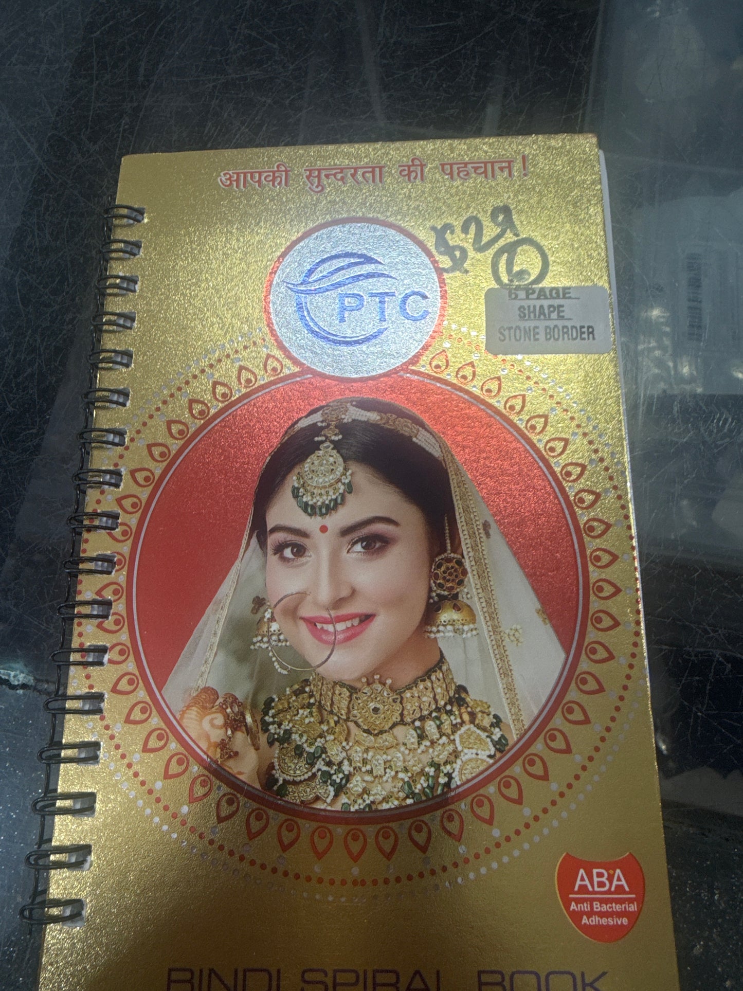 Beautiful designer stone bindi book