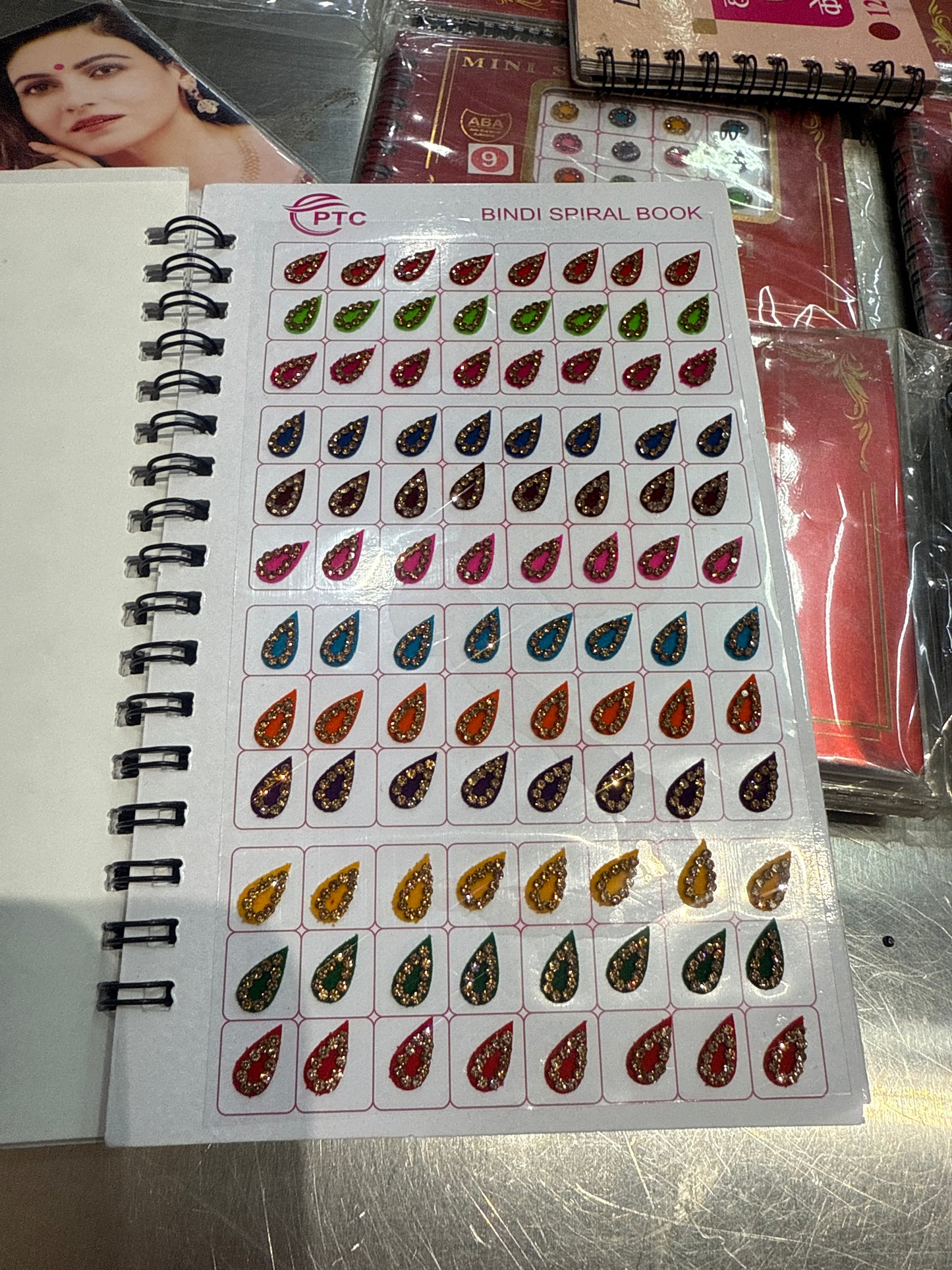 Beautiful designer gold stone tikka/bindi book