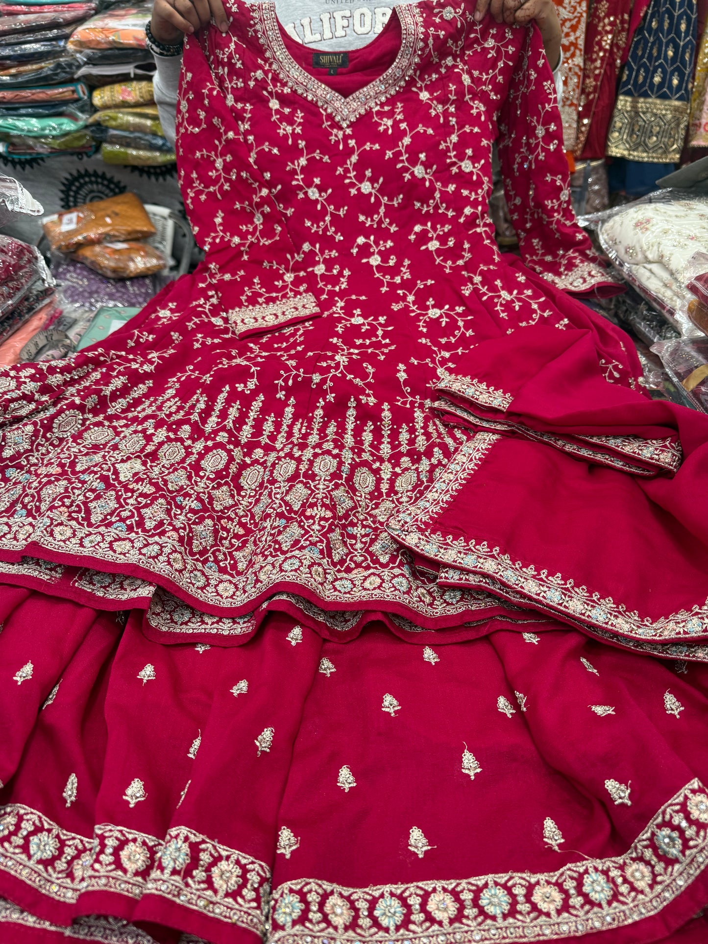 Beautiful designer peplum top plazo suit