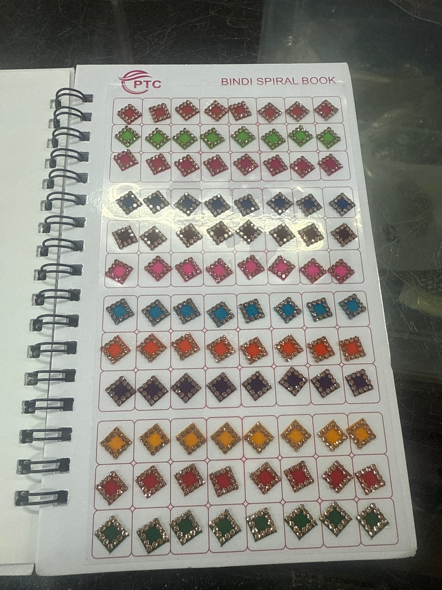 Beautiful designer stone bindi book