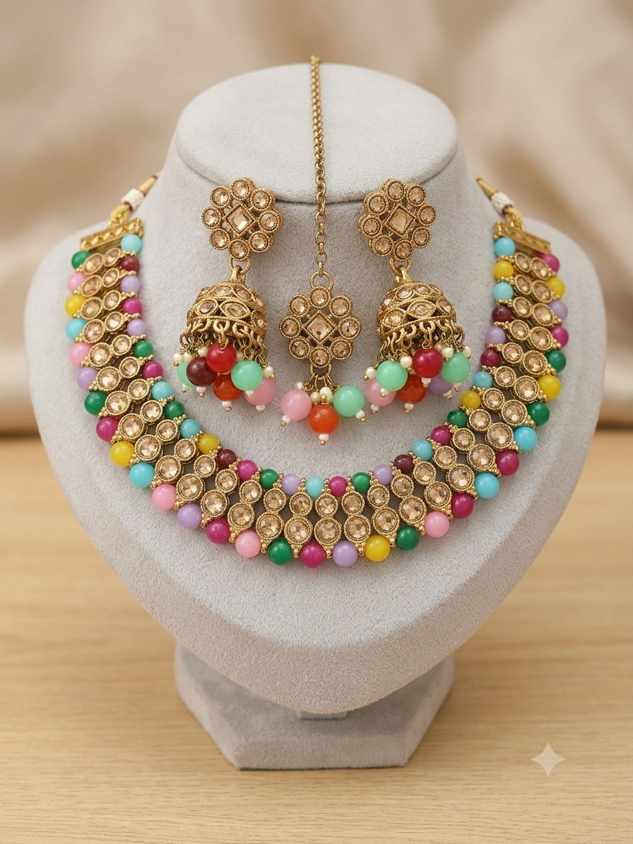 Beautiful designer necklace set with matching jhumki earrings and bindi
