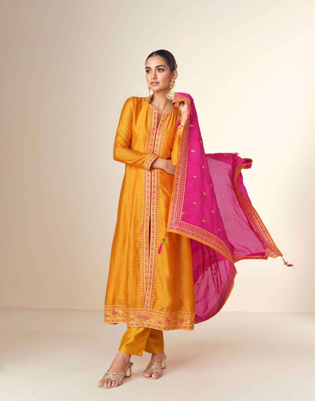 Beautiful designer Pakistani style suit with flare top front slit