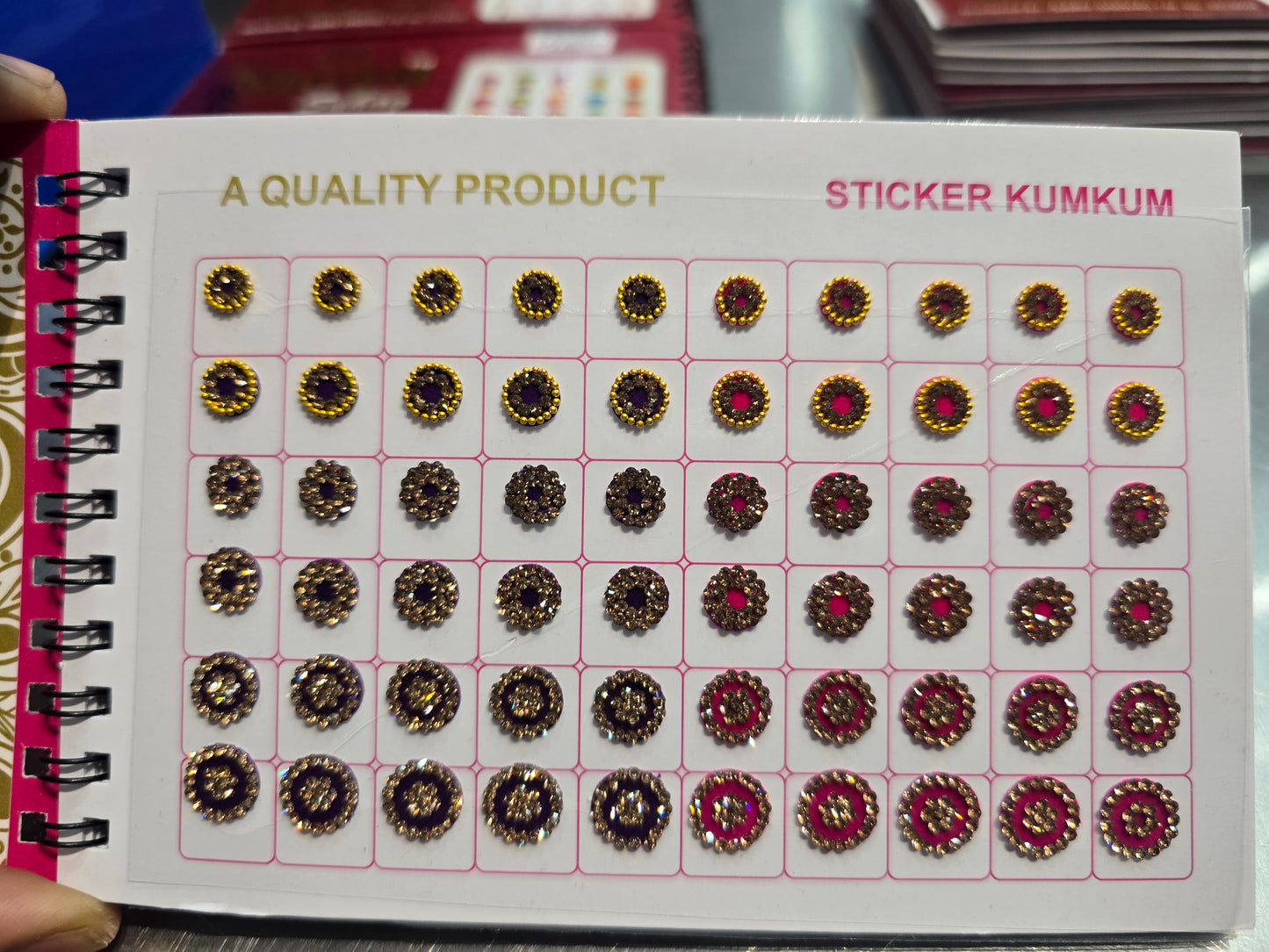 #1 Beautiful designer gold stone tikka/bindi book