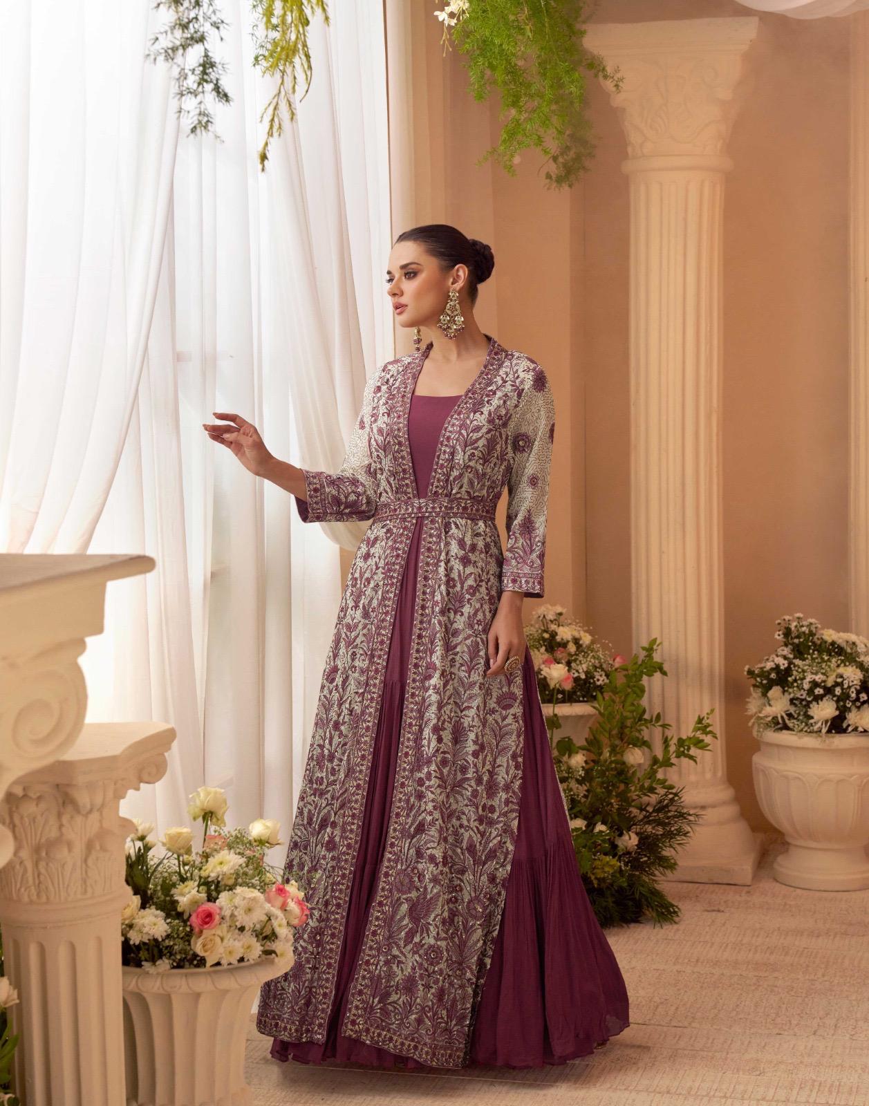 Beautiful designer long gown with fully embroidered koti and belt
