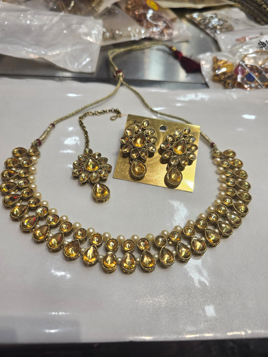 Beautiful designer necklace set with earrings and bindi