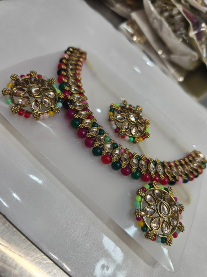 Beautiful designer necklace set with matching studs earrings and tikkah