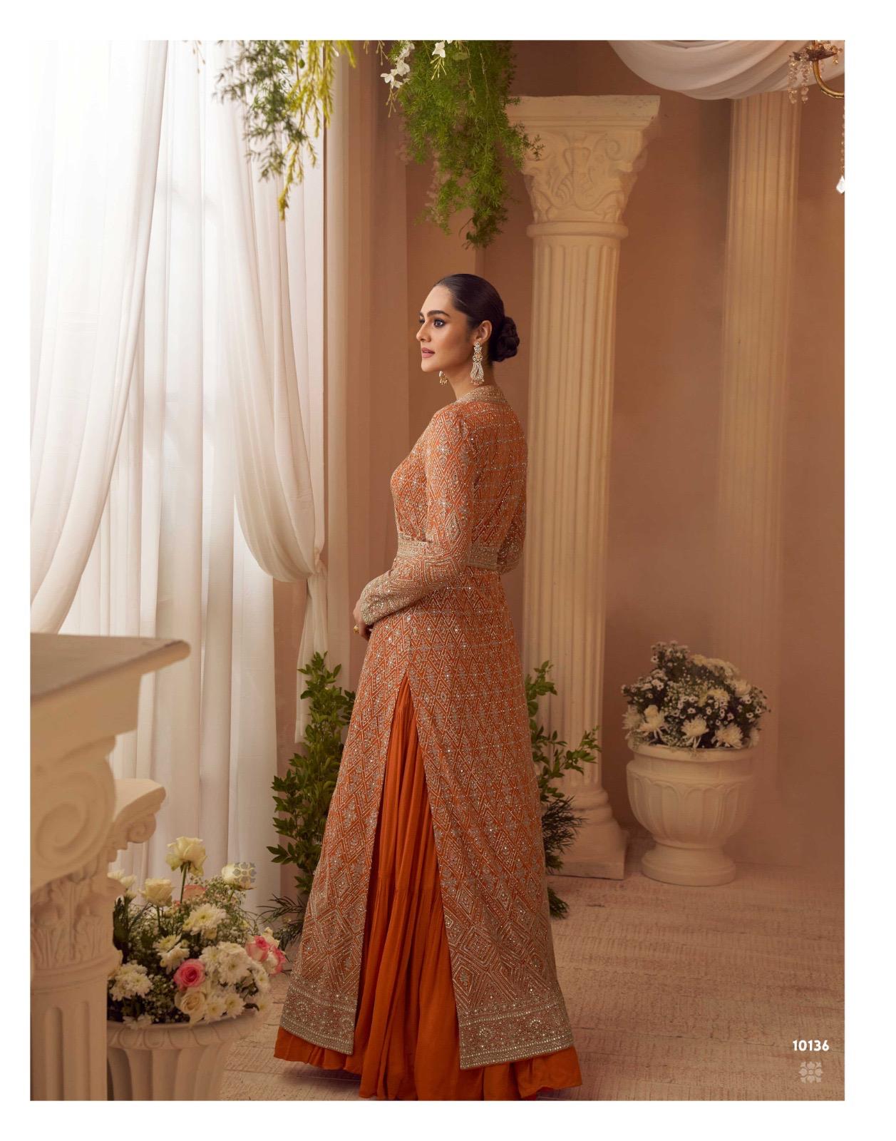 Beautiful designer long gown with fully embroidered koti and belt