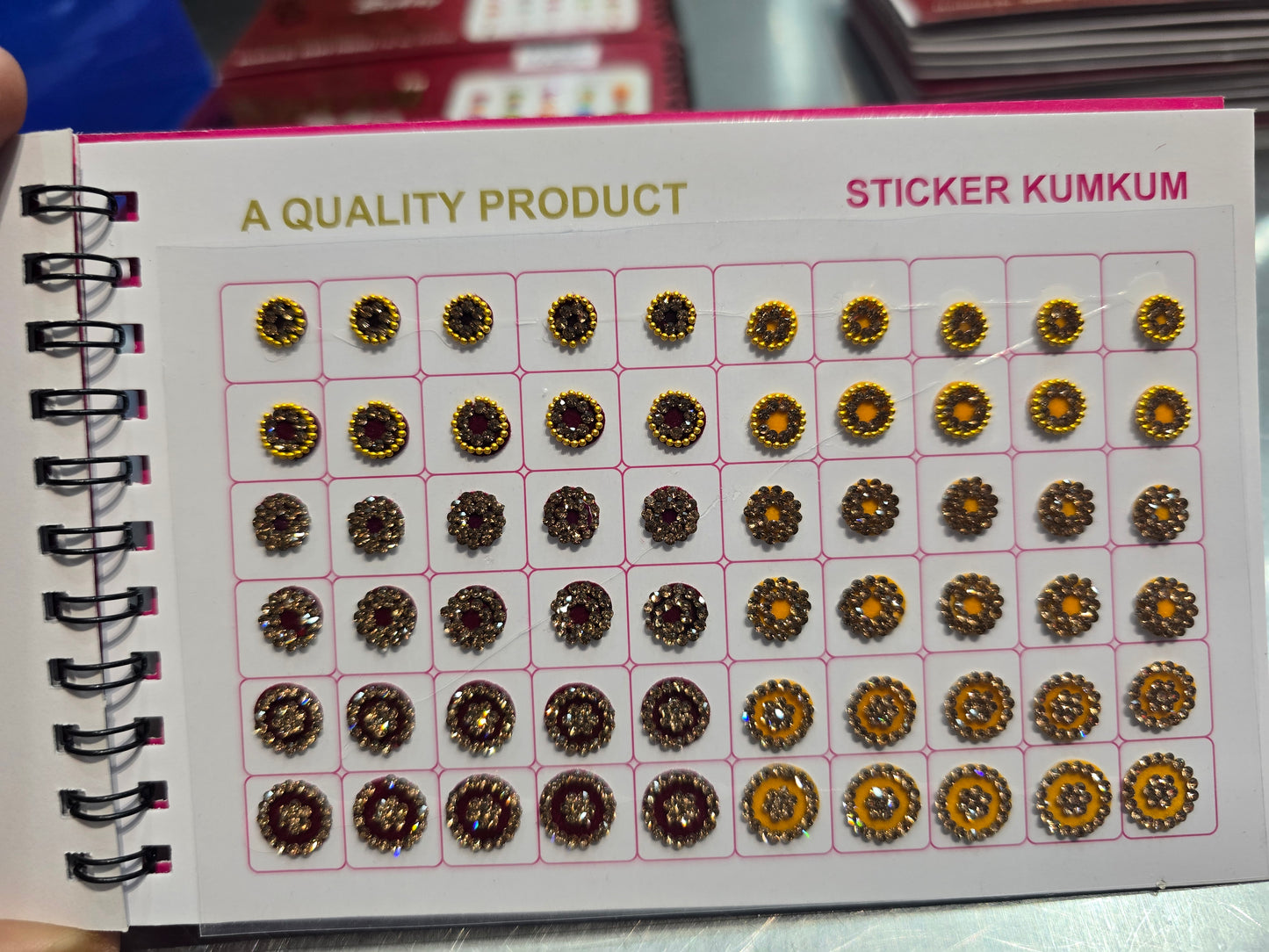 #1 Beautiful designer gold stone tikka/bindi book