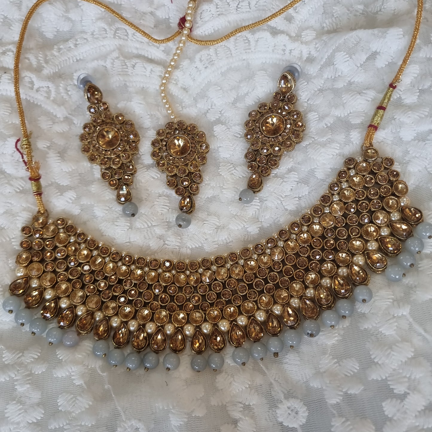 Beautiful designer necklace set with earing and tikkah