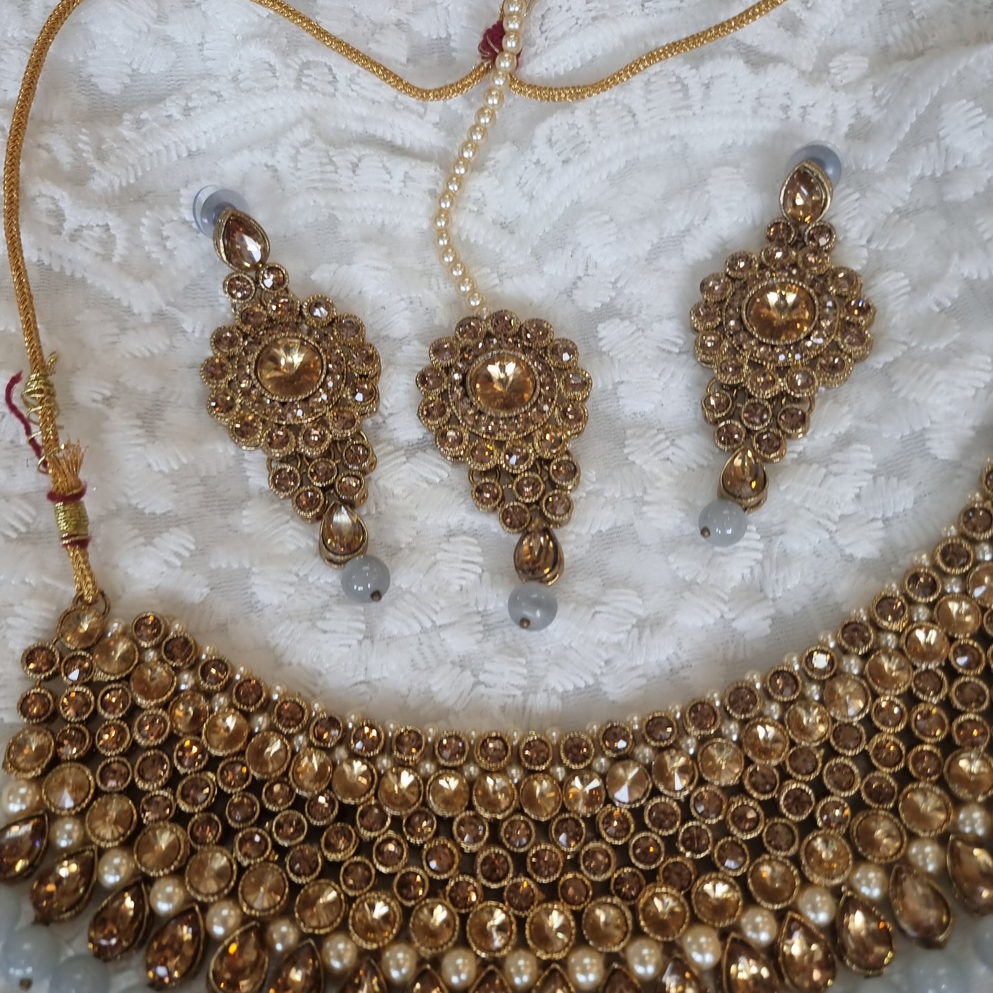 Beautiful designer necklace set with earing and tikkah