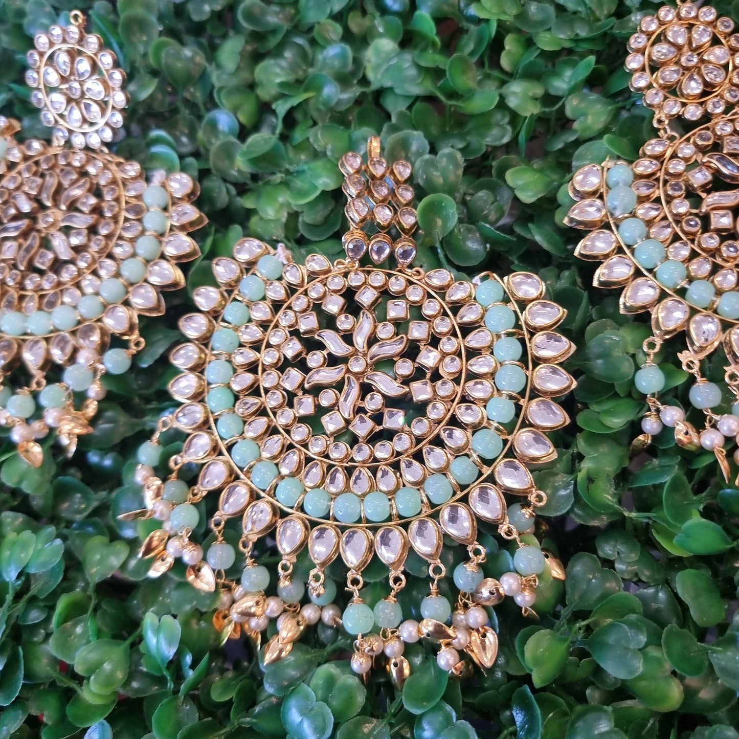 Beautiful designer earrings and tikkah set