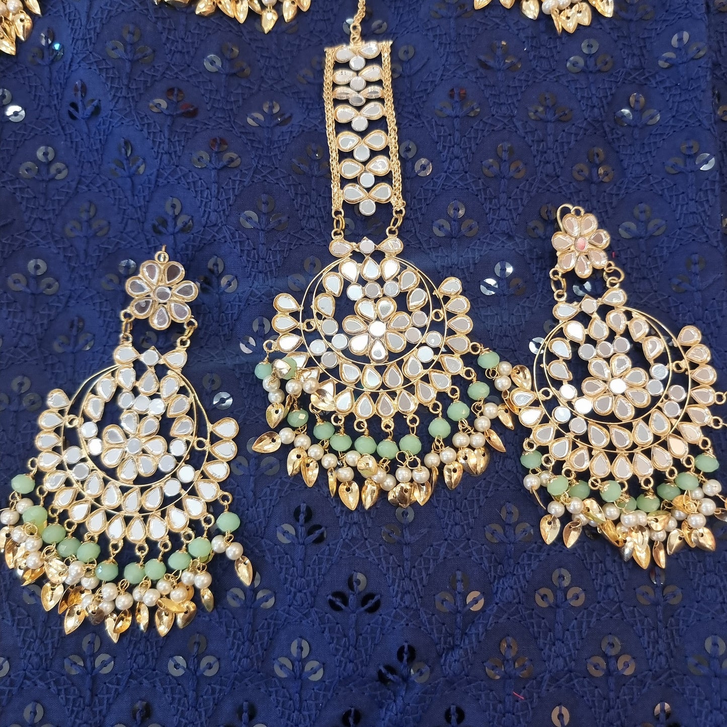 Beautiful designer earing and tikkah set