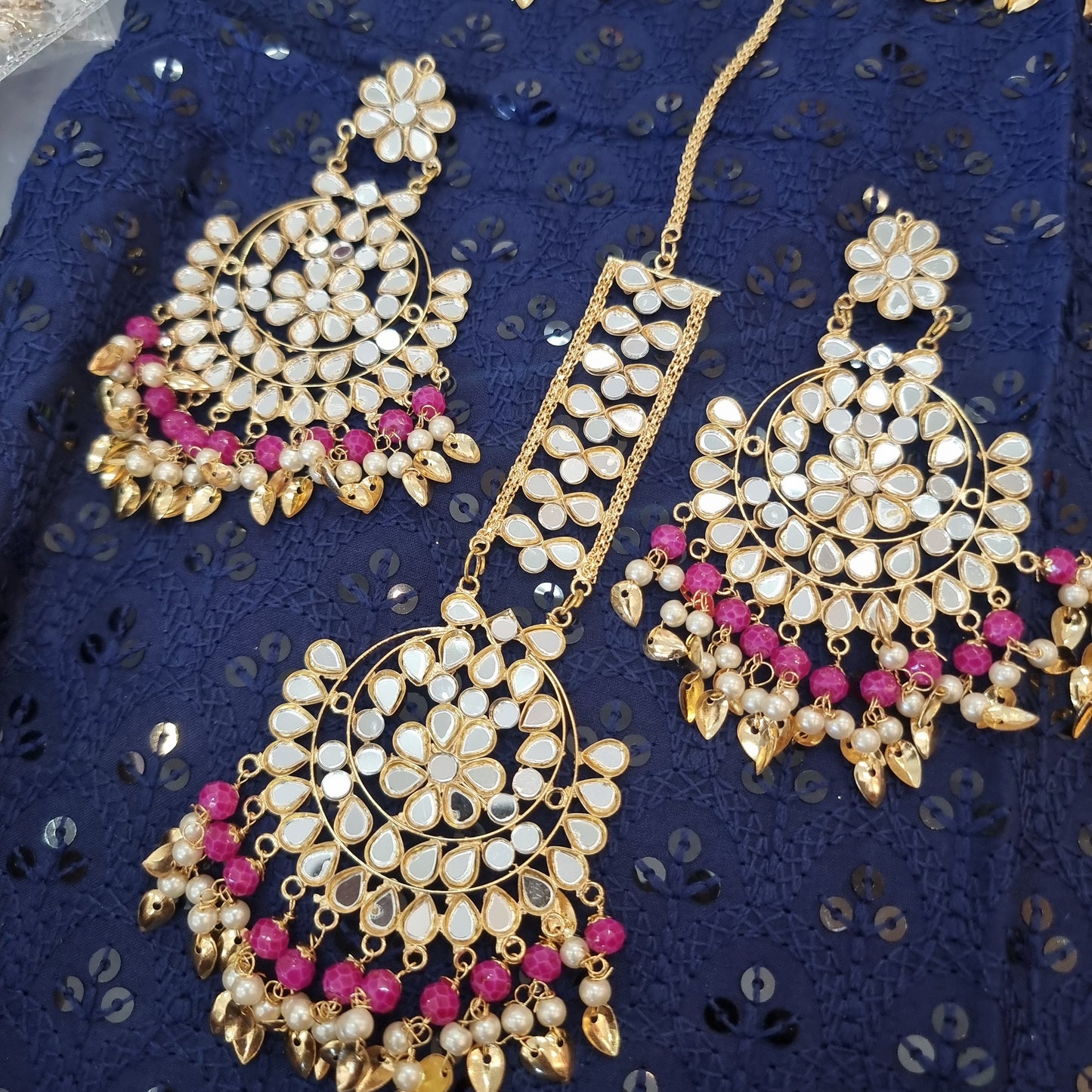 Beautiful designer earing and tikkah set