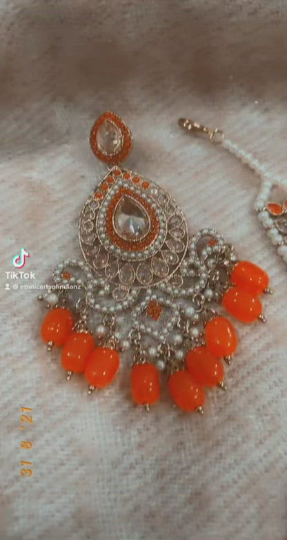 Beautiful designer polki earrings with bindi/tikka