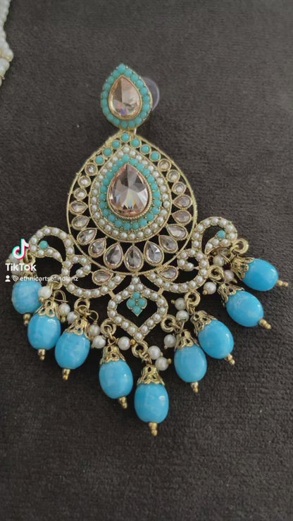 Beautiful designer polki earrings with bindi/tikka