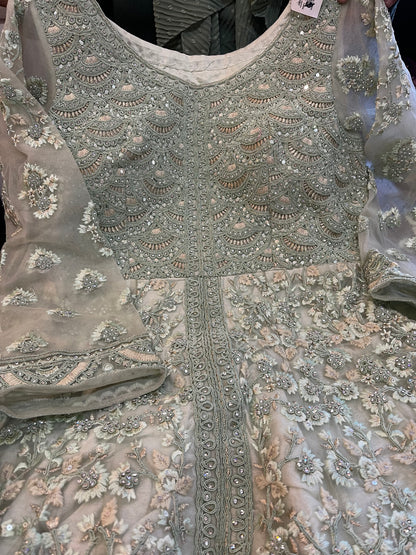 Beautiful designer peplum sharara suit